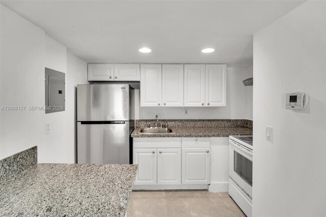 Building Photo - 4335 NW S Tamiami Canal Dr
