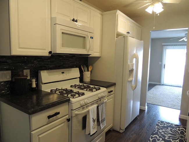 kitchen w/view of dining room - 473 S Platt Rd