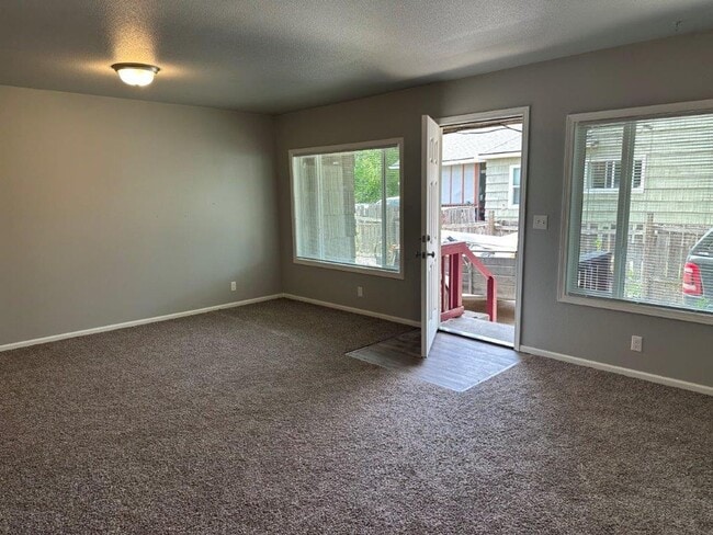 Building Photo - UPDATED single family home, with large yard!