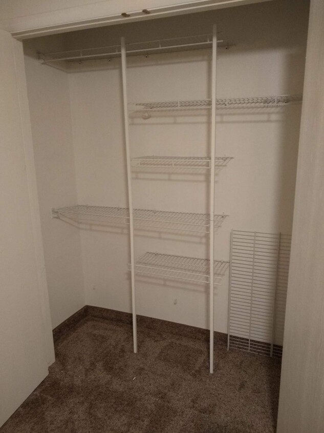Bedroom closet, organizer included. - 361 N 300 W (Morningside)