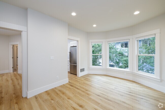 3BR, 1BA - 900SF - Living Room - The Caroline