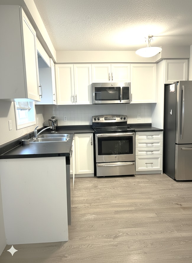 Building Photo - 388-388 Old Huron Rd