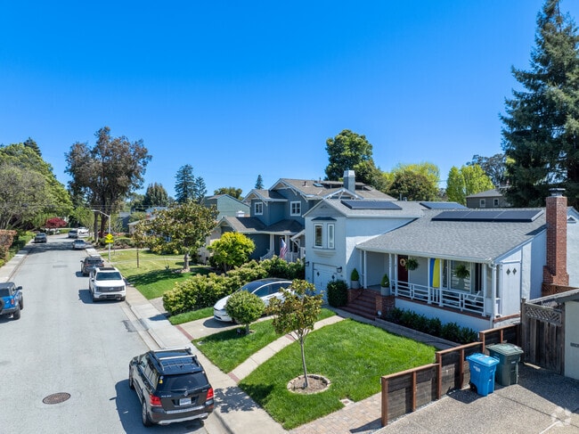 Cozy row homes adorn Burlingame Village, showcasing suburban charm.