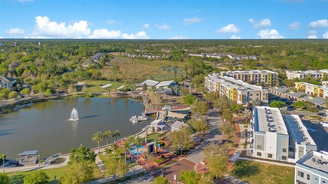 Building Photo - 3/2.5 WITH OVERSIZED FLEX SPACE AND HALF BATH IN OVIEDO'S CITY PLACE