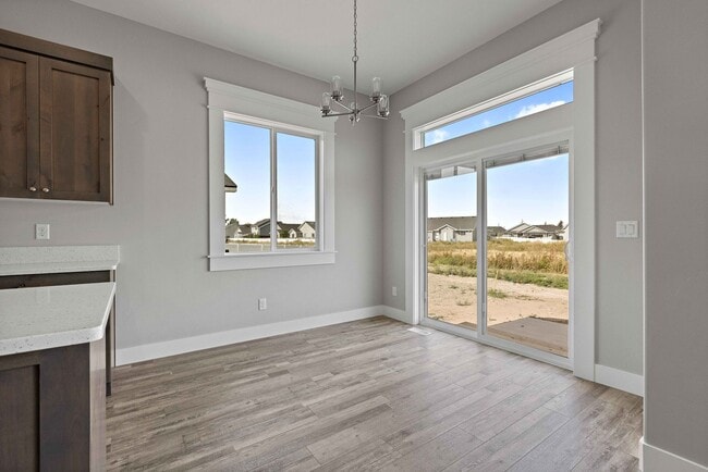 Foto del edificio - NEW HOME with large garage stalls and unfinished basement for additional storage