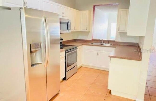 Building Photo - 6233 Ashbury Palms Dr