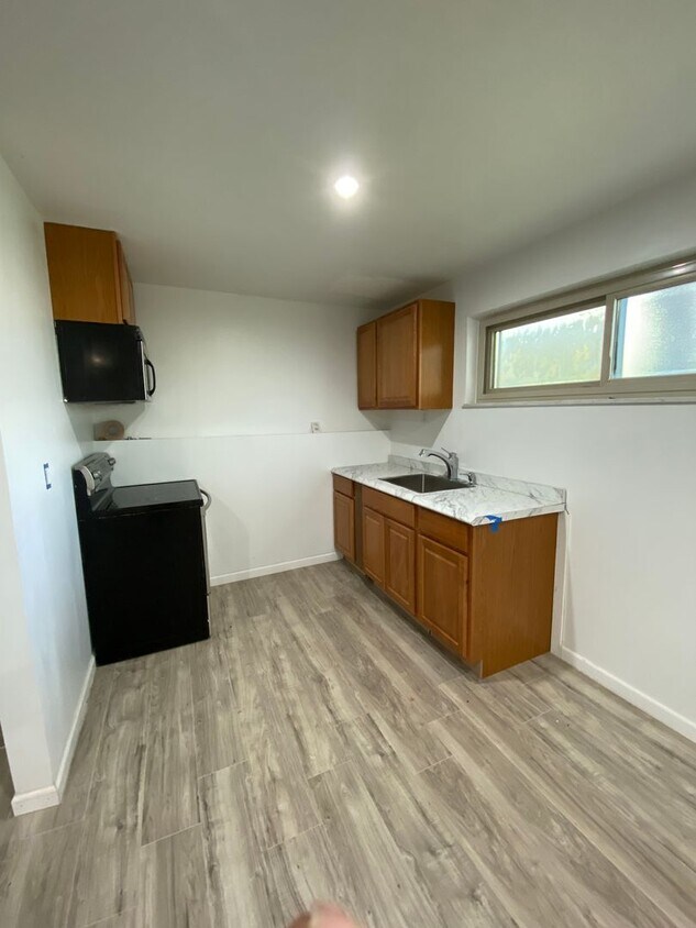 Primary Photo - Fully renovated private basement apartment...