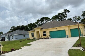 Building Photo - 6157 NW Gatun Dr