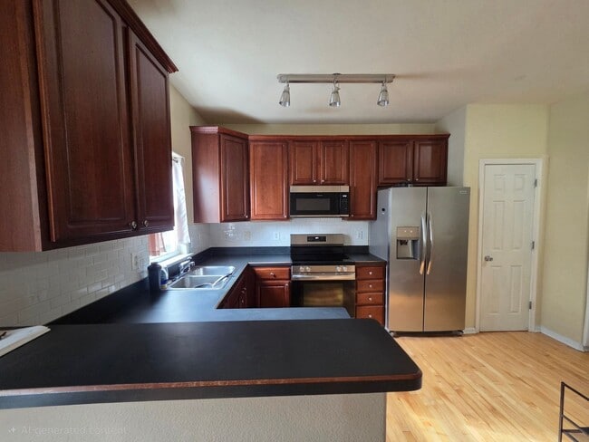 Photo - 3BD/3.5BA Townhouse in Town Center!  with Garage and Patio- First Floor Primary Suite