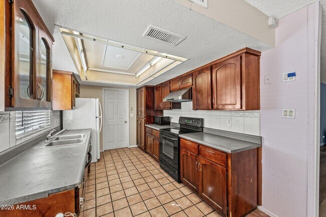 Foto del edificio - 5203 W Laurie Ln