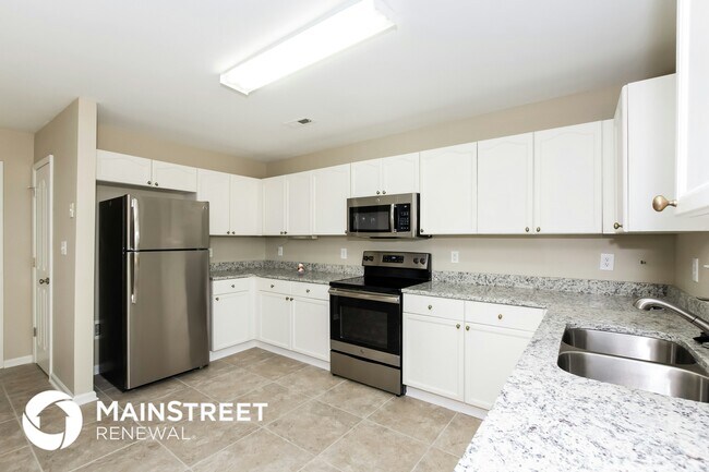 Foto del edificio - 7147 Wandering Creek Dr