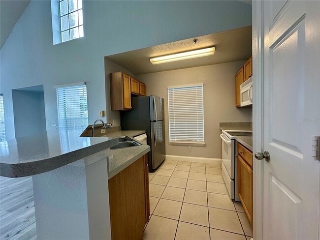 Photo - 9141 Lee Vista Blvd Apartment