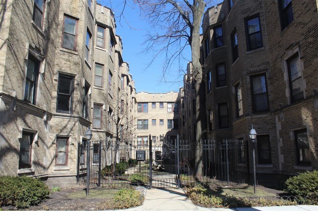 Building Photo - 1230 W Jarvis Ave