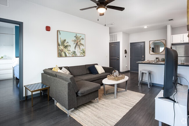3BR, 3BA - 1,134SF - Living Room - Bellamy Daytona (new) Apartments