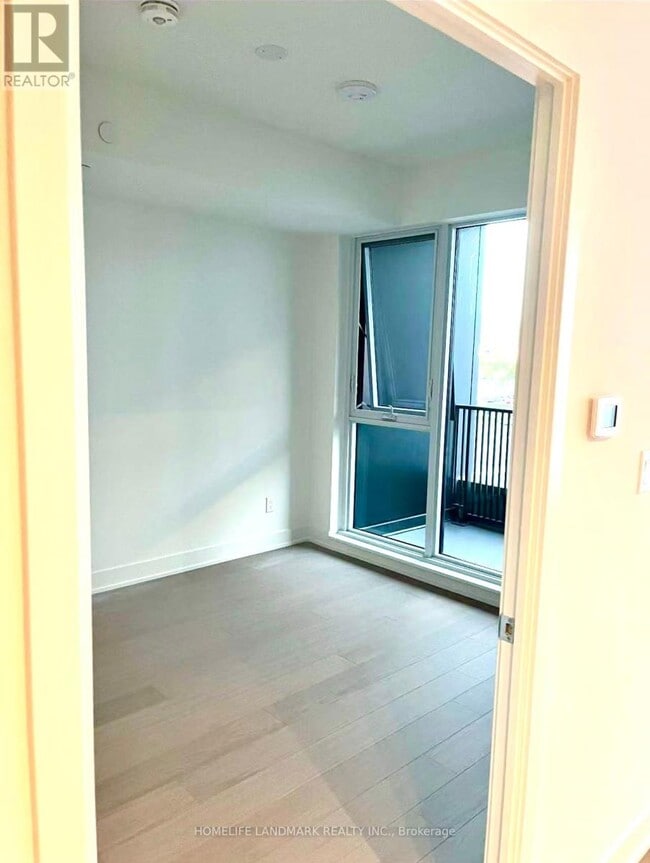 Building Photo - 38-D438 Andre de Grasse St