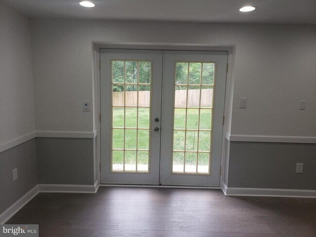 Building Photo - 15003 Plum Tree Way