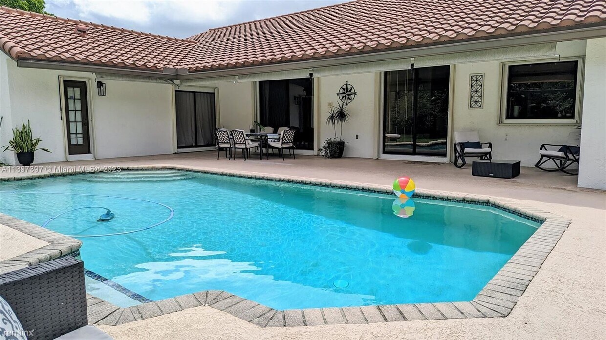 Foto principal - 4 br, 2.5 bath House - 1671 NW 101st Way