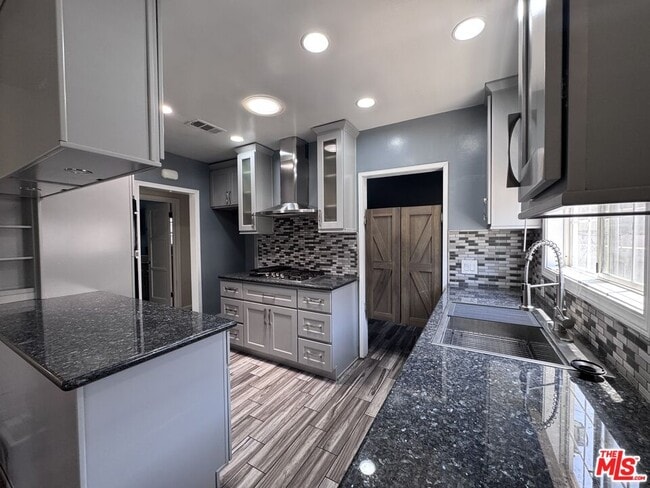 Foto del edificio - 8850 S Wilton Pl