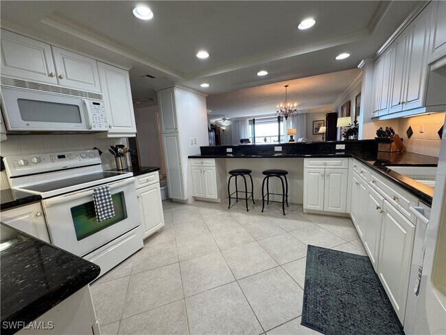 Building Photo - 6075 Pelican Bay Blvd