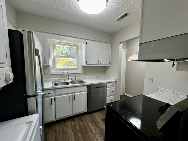 Building Photo - Home For Rent By Capital Property Management