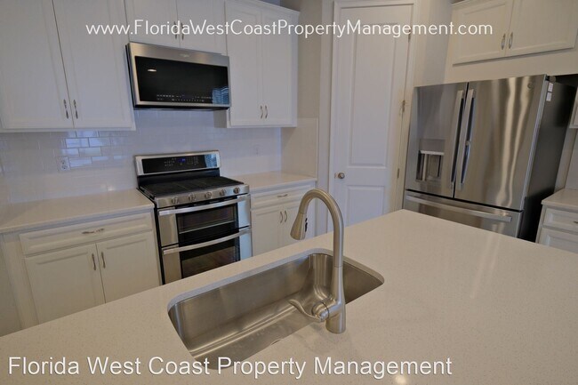 Building Photo - 4 br, 3 bath House - 5854 Long Shore Loop