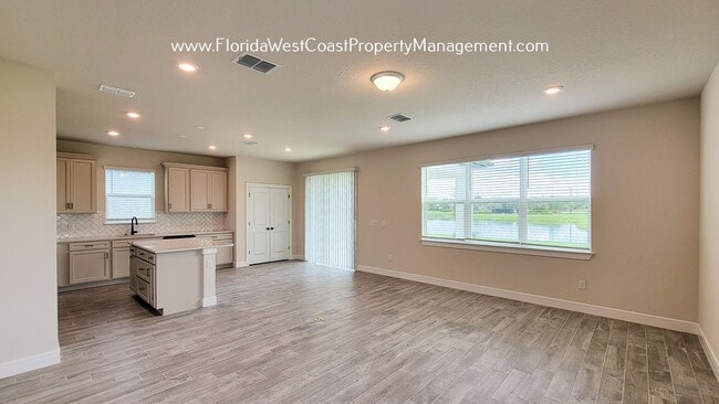 Building Photo - OUTSTANDING NORTH RIVER RANCH HOME! 4 BEDR...