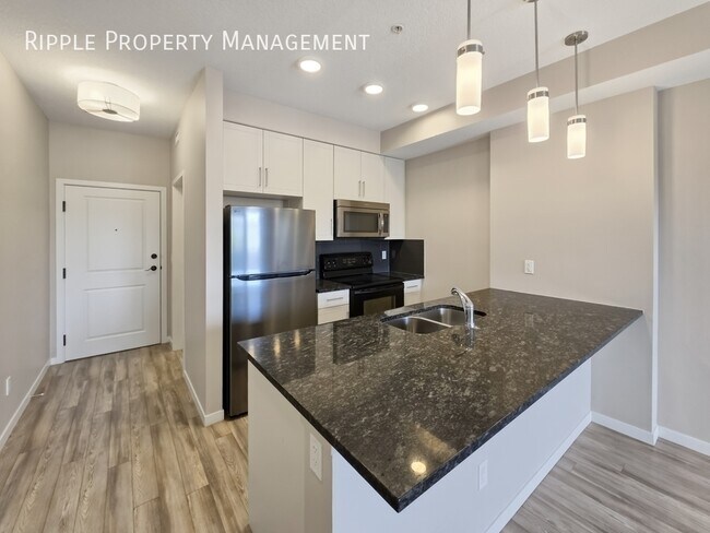 Building Photo - CHARMING 2 BEDS, 1 BATH CONDO | LAKESIDE LIVING IN MAHOGANY