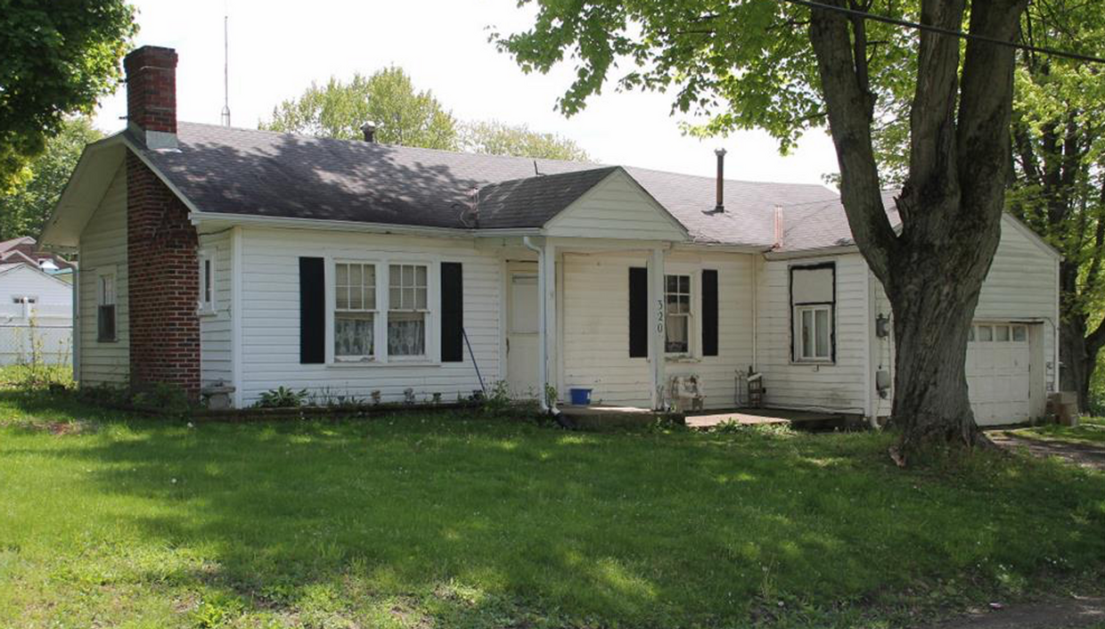 Primary Photo - Madison School ranch, with garage on corne...