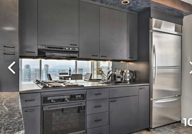 Building Photo - AMAZING FULLY FURNISHED 1 BEDROOM CONDO WI...