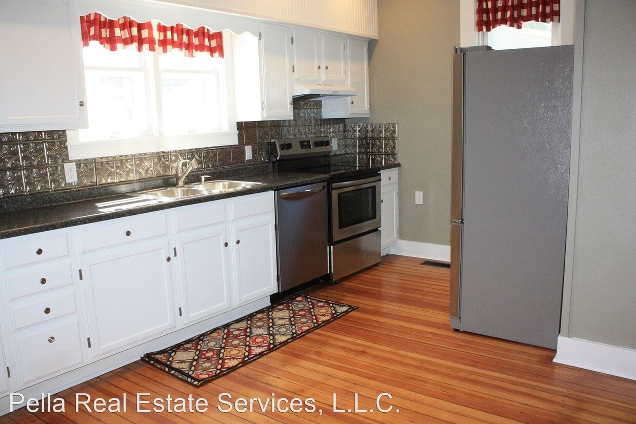Primary Photo - 4 br, 1.5 bath House - 216 E. First Street