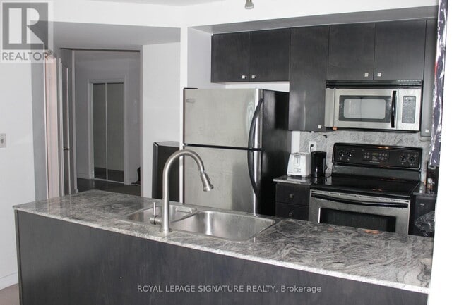 Building Photo - 11-4211 Brunel Ct