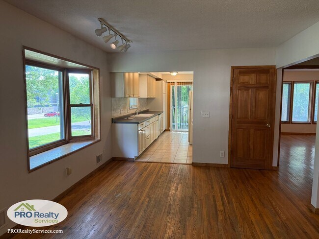 Building Photo - 4 Bedroom Home One Block from Medicine Lake