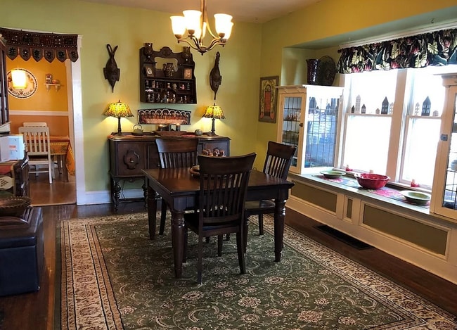 Dining room with built ins, with view into secondary dining room/breakfast nook - 14617 Clifton Blvd