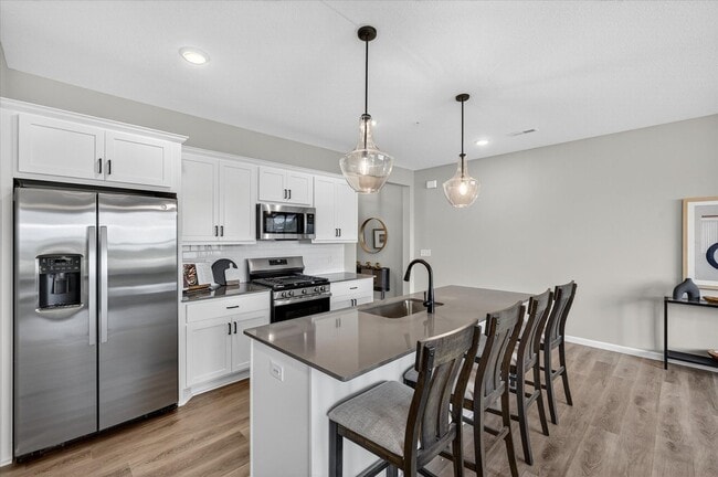 Foto del edificio - Westview townhome plan in Corcoran’s Hope Meadows community—a brand-new townhome development near...