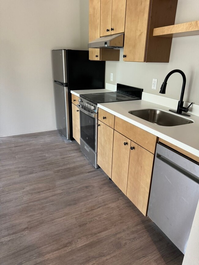 Building Photo - Beautiful, Cozy, Brand New Studio near CSU