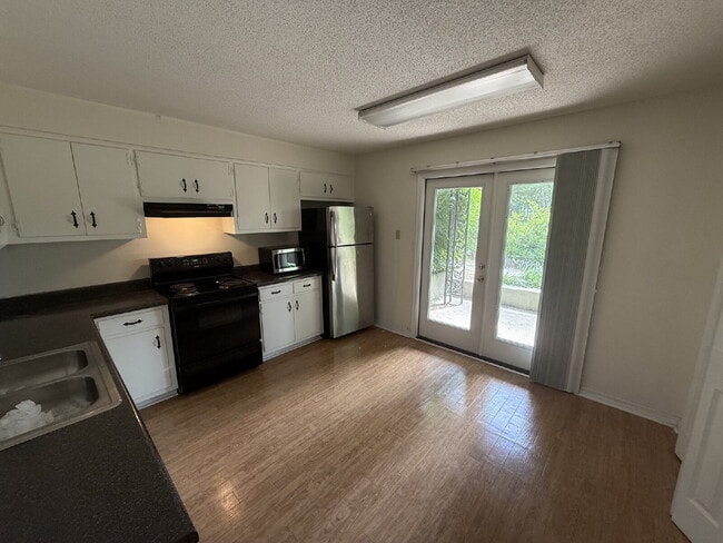Building Photo - Spanish Villa Condo