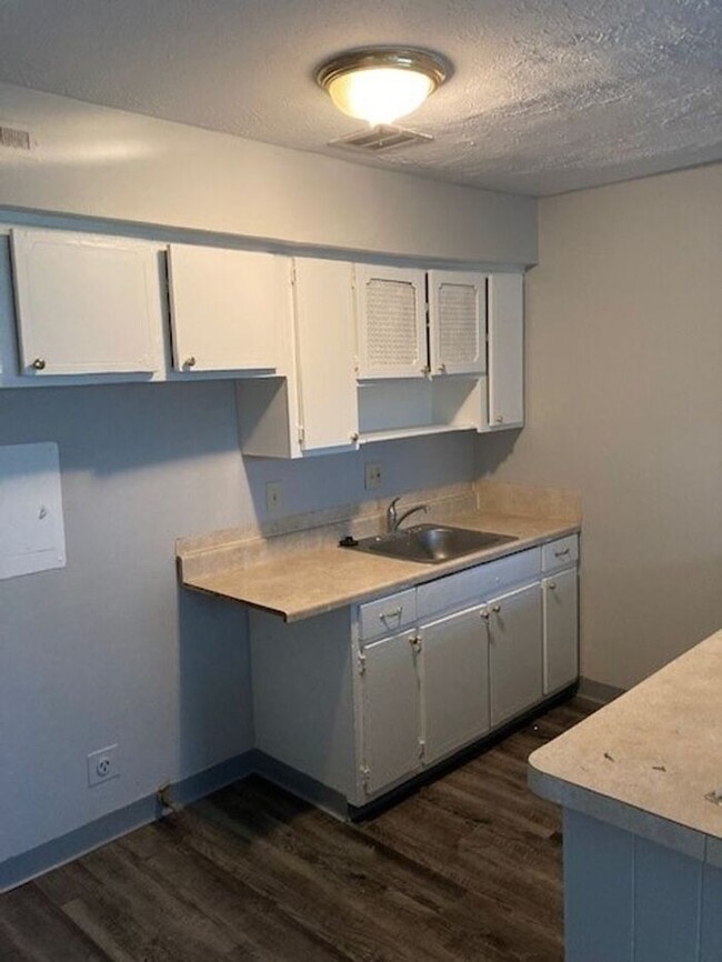 Building Photo - Townhome Sunny Slope Apartments