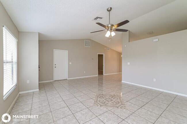 Foto del edificio - 709 DROMEDARY DR, POINCIANA, FL 34759