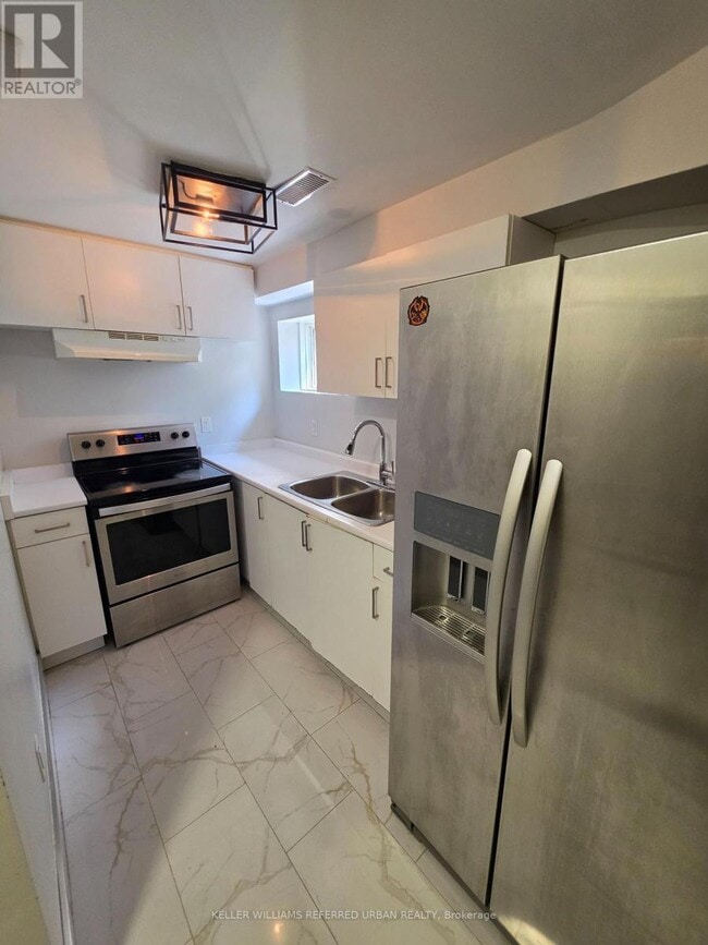 Building Photo - 7009 Lessard Ln