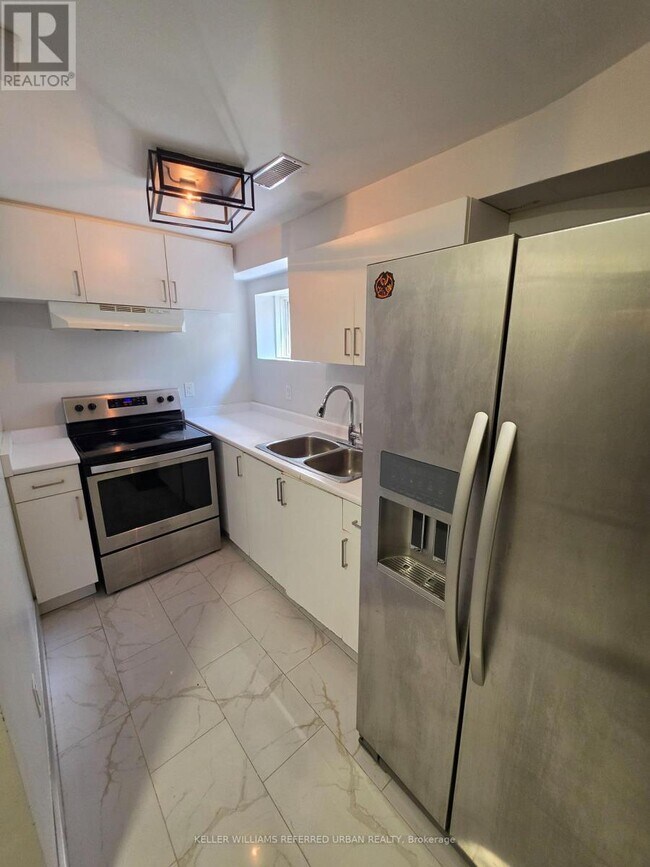 Photo du bâtiment - 7009 Lessard Ln