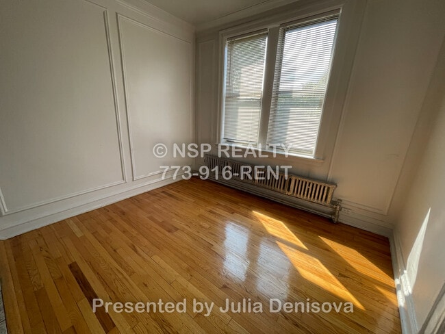 Building Photo - 1373 W Estes Ave