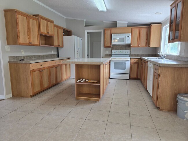 Building Photo - Available in Soon! Quiet Country Living! Spacious 4 Bed, 2 Bath In Currituck