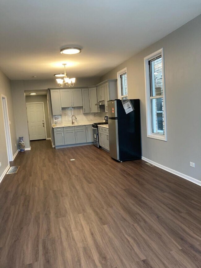 Brand new flooring and windows - 3553 S Damen Ave