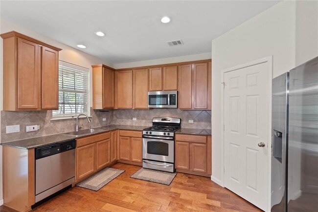 Building Photo - 1310 W Parmer Ln