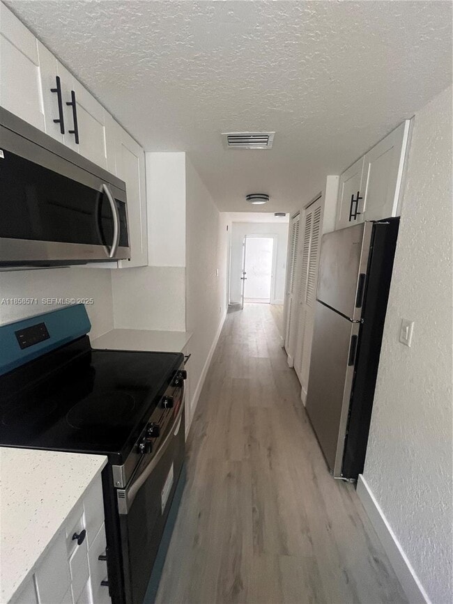 Building Photo - 3417 NW 22nd Ave