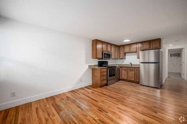 1BR, 1BA - 550SF - Living Room/Kitchen - 419 E 7th