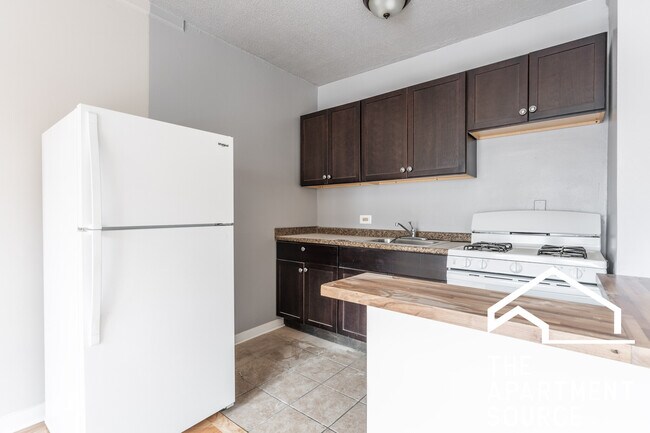 Foto del edificio - 5662 N Ridge Ave