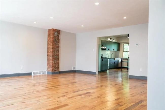 Open concept living/dining room and into the kitchen - 1120 Brabec St