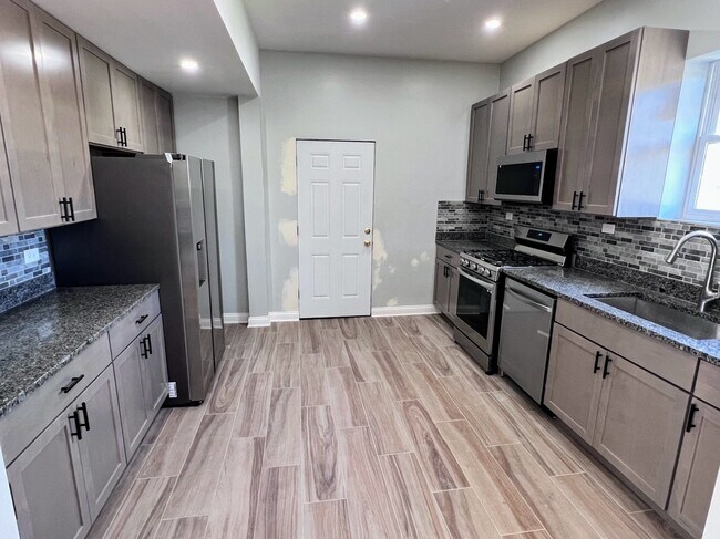 Foto del edificio - 4244 N Spaulding Ave