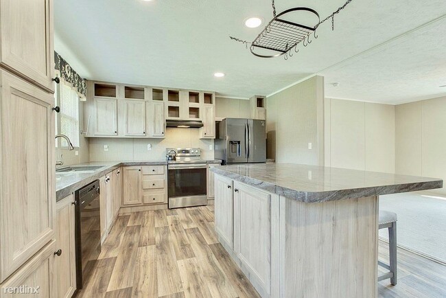 Foto del edificio - 4 br, 2 bath House - 608 S Matlock Ave